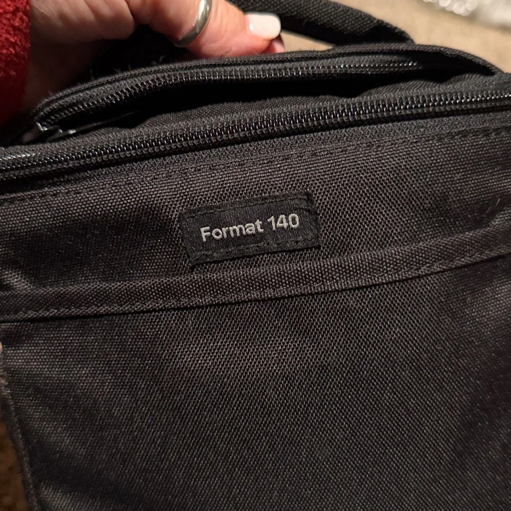 Lowepro Format 140 padded camera case w/handle & shoulder or crossbody strap
